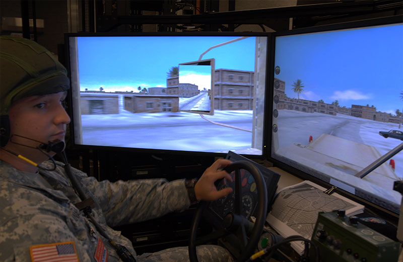 Soldier driving a simulated vehicle