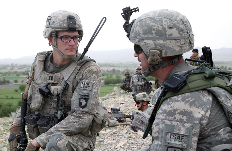 Two Soldiers in combat gear