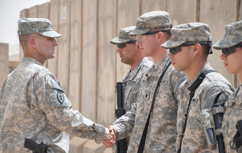 A Soldier renders a salute to the Brigade Commander