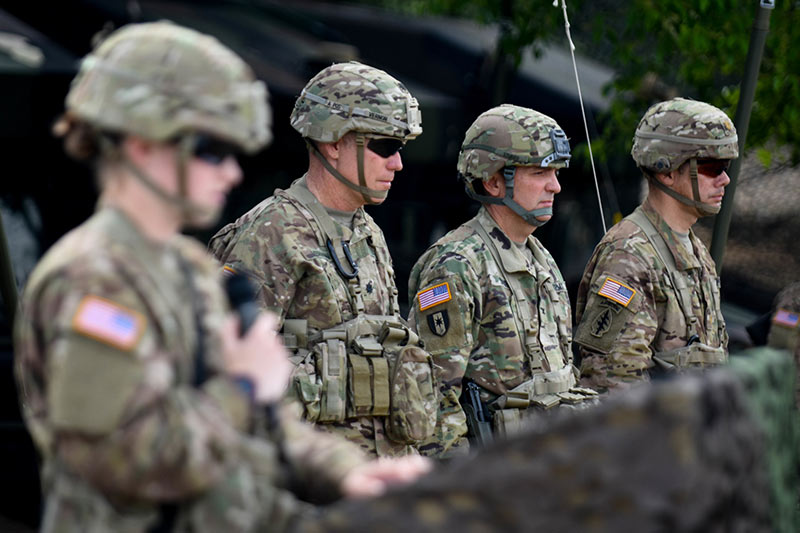Group of Soldiers observing an exercise