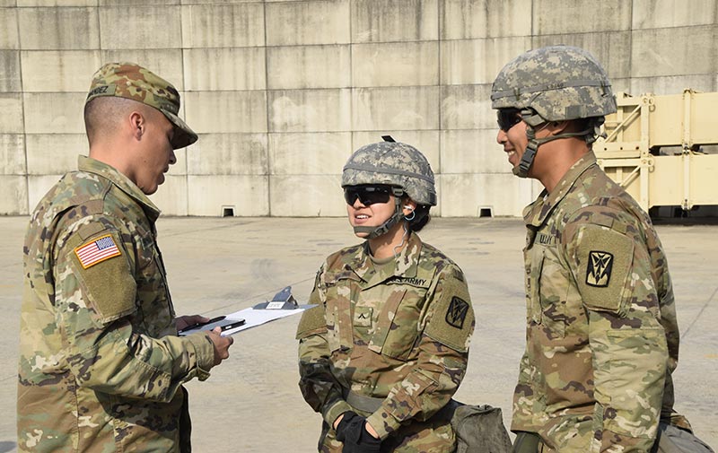 Soldiers receive feedback after executing a march order and emplacement