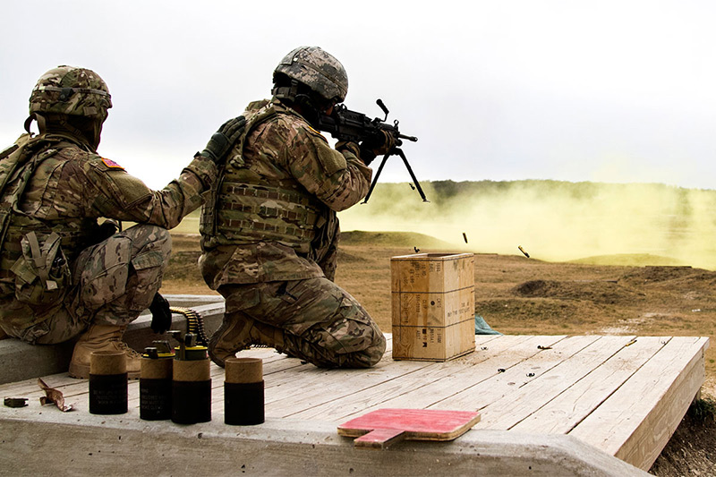 Two Soldiers practicing shooting